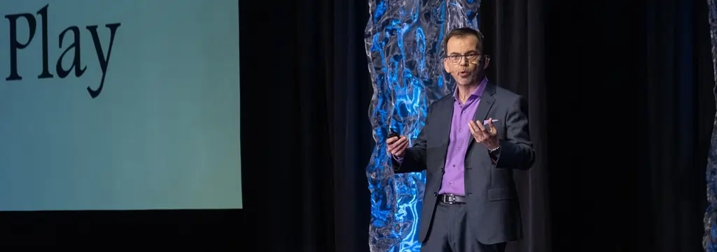 Top Professional Speaker Coach and Mentor Jason Reid on-stage.