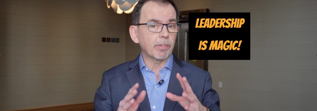 A photo of Jason Reid with the words "leadership is magic."