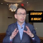 A photo of Jason Reid with the words "leadership is magic."