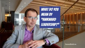 What do you mean by "awkward leadership"? A photo of Jason Reid sitting in a hotel lounge