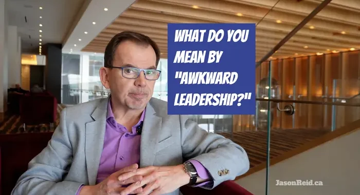 What do you mean by "awkward leadership"? A photo of Jason Reid sitting in a hotel lounge
